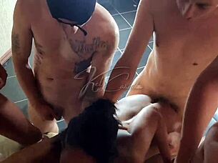 Latina housewife enjoys sensual gangbang with seven friends.