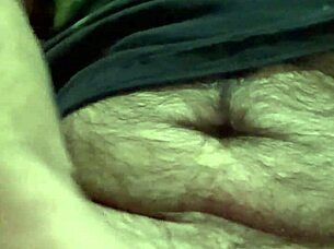 i'm playing with my foreskin and balls, shooting my load into the camera