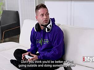 Seductive milf in lingerie facesitting nerd during game