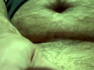 i'm playing with my foreskin and balls, shooting my load into the camera