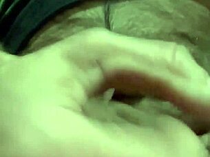 i'm playing with my foreskin and balls, shooting my load into the camera