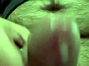 i'm playing with my foreskin and balls, shooting my load into the camera