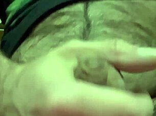 i'm playing with my foreskin and balls, shooting my load into the camera