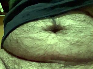 i'm playing with my foreskin and balls, shooting my load into the camera