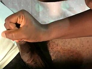 Watch this BBC get a sloppy handjob from the milf