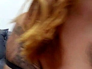 Hot redhead flashes her tits and pink pussy!