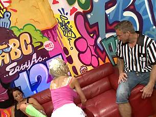 In this orgy, brunette and blonde milfs in heels handle monster cocks until cumshots.