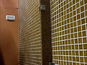 Someone's spying in the locker room shower, keeping an eye on the action.