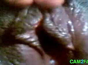 I watch this ebony girl masturbating on webcam, feeling so aroused