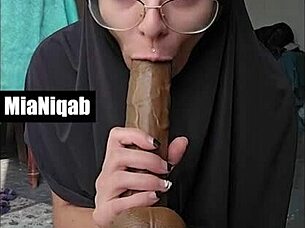 Does Mia Niqab's Dildo Play and Cum Facial Look This Hot?