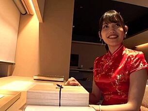 Seductive Japanese beauty in cheongsam.