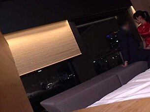 Seductive Japanese beauty in cheongsam.