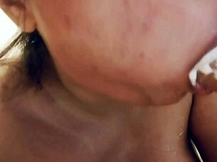 Sucking Messy Milk-Filled Dildo Up Close