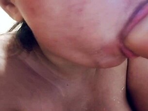 Sucking Messy Milk-Filled Dildo Up Close