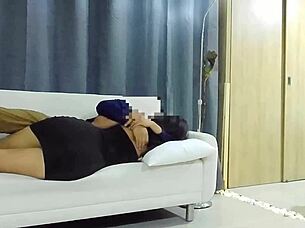 Look at this big-ass beauty in black dress getting fucked on the couch?