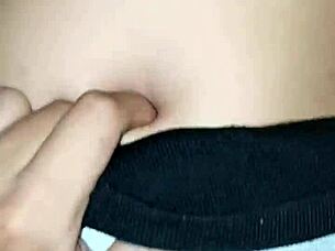 I peck her belly button as she rides me passionately