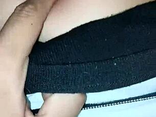 I peck her belly button as she rides me passionately