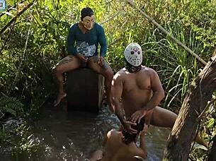 well-endowed guys fuck girl in forest dp