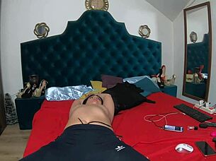 Watch milfycalla tease her pussy in shorts, building to an intense orgasm