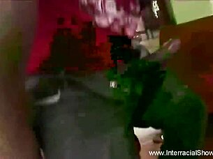 A black stud takes an Asian MILF from behind