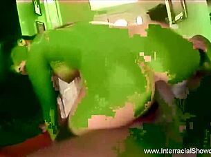 A black stud takes an Asian MILF from behind