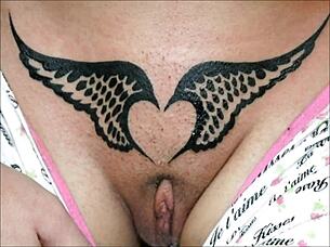 Crystal butterfly shows her tattooed pussy