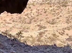 in a cave, she performs outdoor blowjob on monster cock, risking public exposure