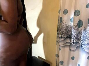 Thick ebony rides dildo in lingerie.