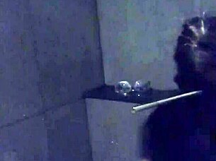 asian slut wife teasing with dildo in gym shower?