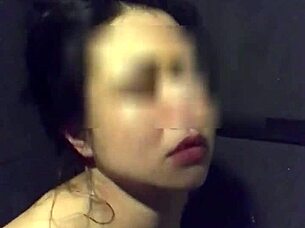 asian slut wife teasing with dildo in gym shower?