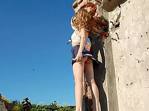 Spunky teen model strips naked during steamy outdoor photoshoot.