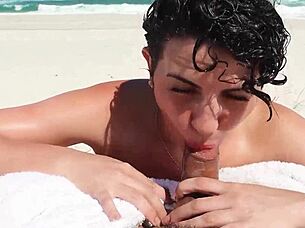 This slut gave me a blowjob on the beach in front of everyone