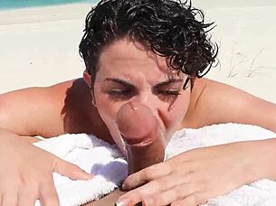 This slut gave me a blowjob on the beach in front of everyone