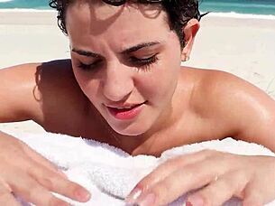 This slut gave me a blowjob on the beach in front of everyone