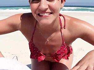 This slut gave me a blowjob on the beach in front of everyone