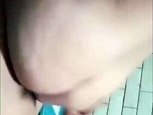 I'm the Indonesian aunt feeling horny while my husband works in the field, craving some action