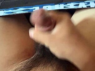 ASIAN AMATEUR MASTURBATES WITH CONDOM ON