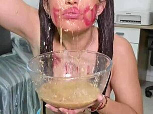 Eating junk food then spitting it all out in a solo session with pigtails brunette.