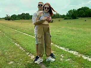 Sexy redhead teases me before sucking cock.