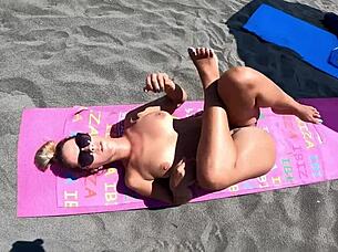 check out steamy nude beach striptease and ass shaking