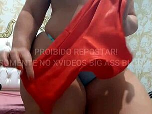 Mature BBW milf shows off her big tits and ass in black shorts and white panties