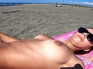 check out steamy nude beach striptease and ass shaking