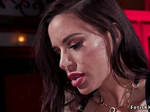 Mistress uses dildo on strapped male in bdsm scene