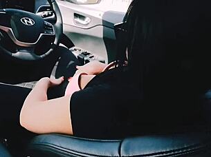 Is she horny enough to masturbate in the car?