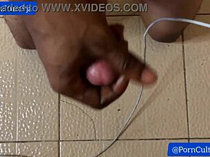 Woman on her knees jerking off a cock specifically