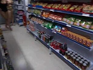 Manager and assistant handle blonde and brunette's payment.