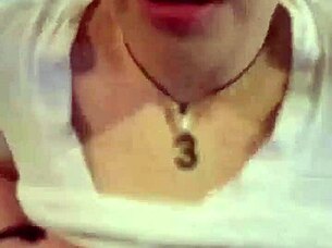 Ebony milf flashes saggy tits in shorts