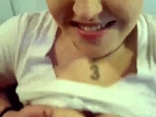 Ebony milf flashes saggy tits in shorts