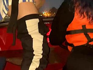 Girls surprise guy on boat and suck him.