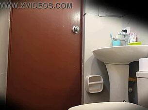 Hidden Camera In Bathroom Of Curvy Colombian University Student!